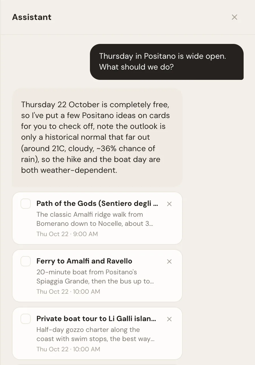 The Whimbrel assistant answering a question about a free day in Positano with checkable suggestions